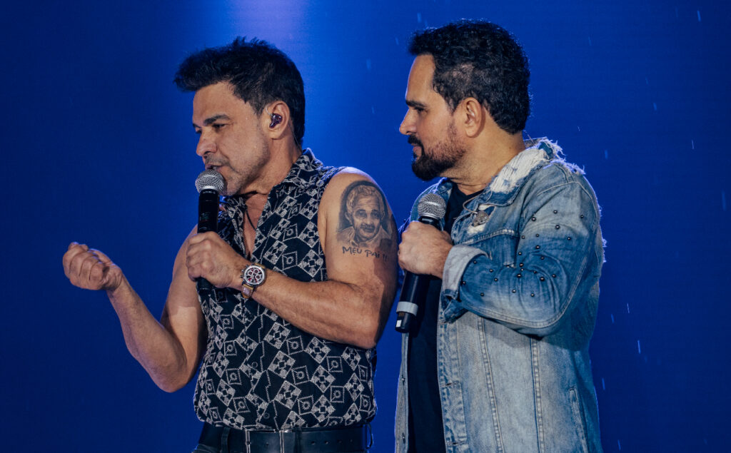 Mesmo sob chuvas fortes, Zezé Di Camargo e Luciano reúnem mais de 80 mil pessoas em apresentação memorável no Verão Maior Paraná